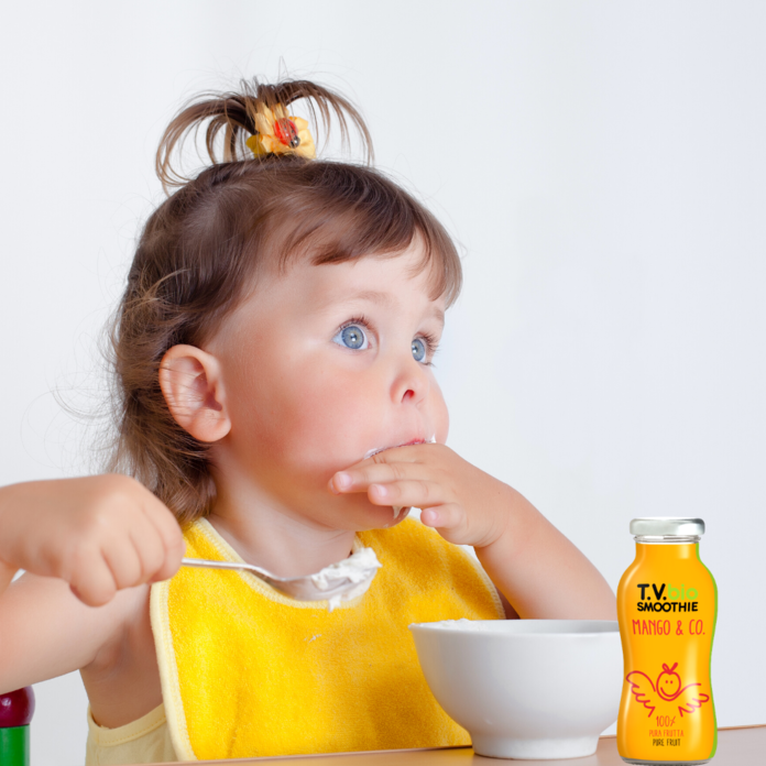 Bimba che si gusta T.V.bio gusto Mango